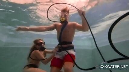 Hot chicks with a guy in the pool