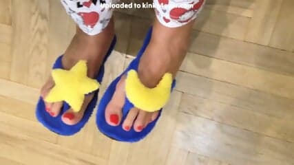 Girlie Fuzzy Moon Flip Flops And Red Toenails